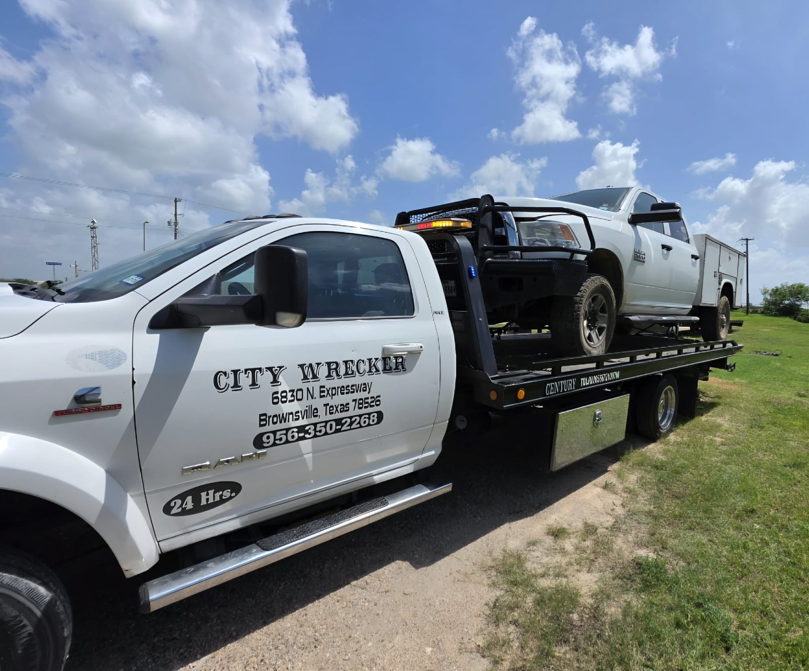 City Wrecker towing car